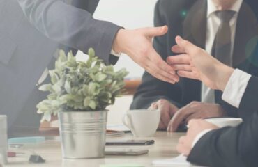 Handshake on a business meeting